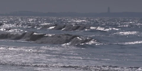 Medium shot of sea waves moving towards the beach Stock Footage 103485695