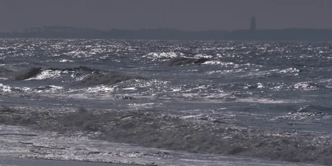 Medium shot of sea waves moving towards the beach Stock Footage 103485824