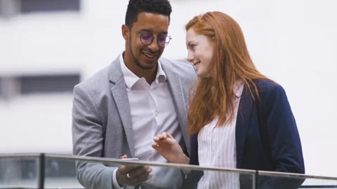 Medium shot side view of amused young female entrepreneur holding digital tablet Stock Footage 278011460