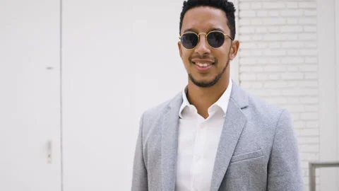 Medium shot side view of amused young female entrepreneur holding digital tablet Stock Footage 278011814