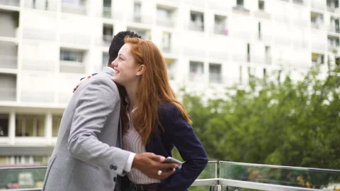 Medium shot side view of amused young female entrepreneur holding digital tablet Stock Footage 278012022