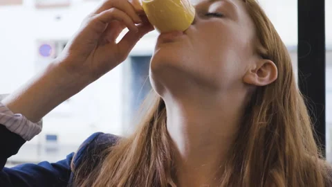 Medium shot side view of amused young female entrepreneur holding digital tablet Stock Footage 278012325