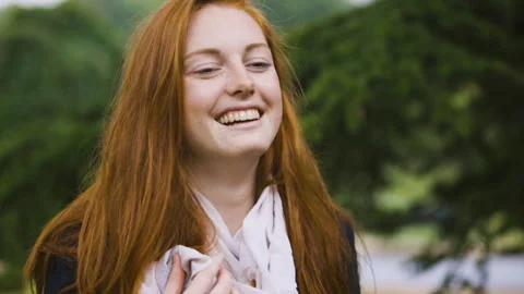 Medium shot side view of amused young female entrepreneur holding digital tablet Stock Footage 278012474