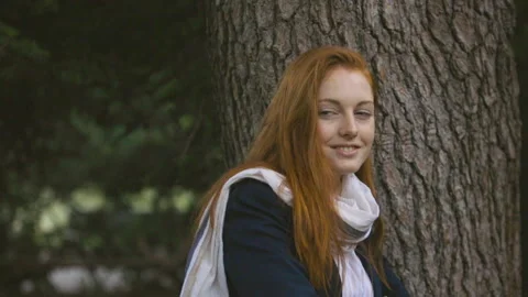 Medium shot side view of amused young female entrepreneur holding digital tablet Stock Footage 278012583