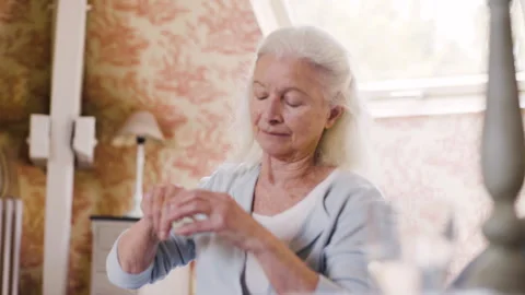 Medium shot side view of amused young female entrepreneur holding digital tablet Video stock 278012909