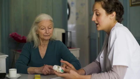 Medium shot side view of amused young female entrepreneur holding digital tablet Stock Footage 278013372