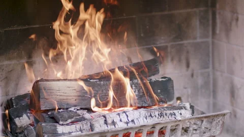 Medium shot, slow motion fire in a fireplace Video stock 137138327