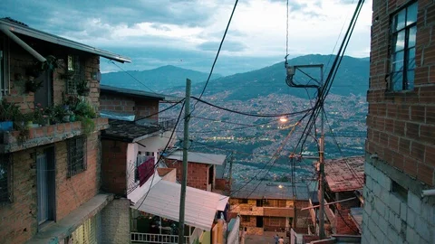 Medium shot in the streets of Comuna 13, a slum in Medellin, Colombia Stock Footage 105027372
