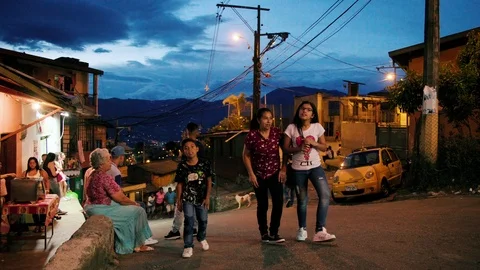 Medium shot in the streets of Comuna 13, a slum in Medellin, Colombia Stock Footage 105027463