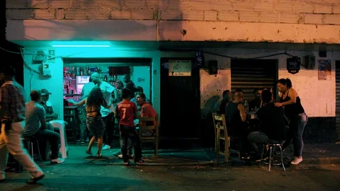 Medium shot in the streets of Comuna 13, a slum in Medellin, Colombia Stock-Footage 105027908