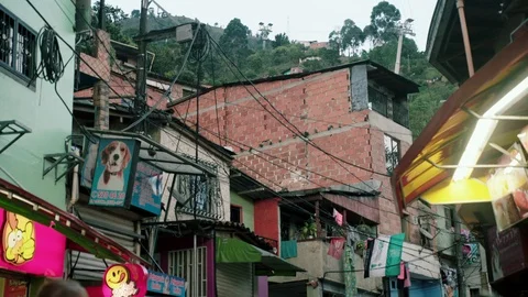 Medium shot in the streets of Comuna 13, a slum in Medellin, Colombia Stock Footage 105027983