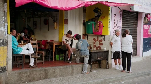 Medium shot in the streets of Comuna 13, a slum in Medellin, Colombia Stock Footage 105029361