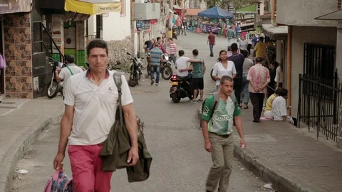Medium shot in the streets of Comuna 13, a slum in Medellin, Colombia Stock Footage 105029454
