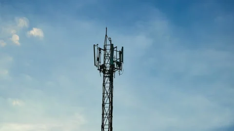 Medium shot Time Lapse of cell phone communications tower with clouds Video stock 57375473