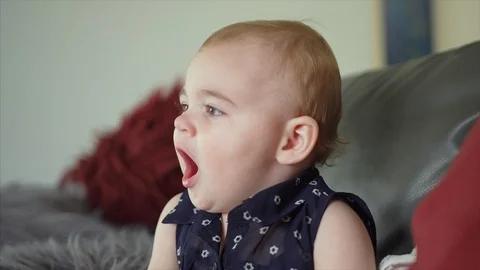 Medium shot of a Toddler yawning. Stock Footage 106565106