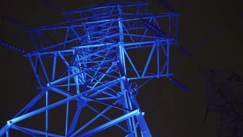 Medium shot, Tower of Power Lines in city, nigth 4K, HDR blue light Stock Footage 141546881