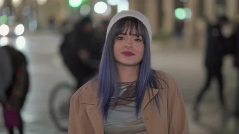 Medium shot of a very confident young girl with the background out of focus with Stock Footage 231114933