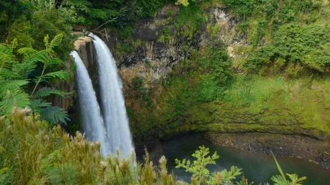 Medium Shot of Water Flowing Over Wailua Falls - Not Graded - MOS Stock Footage 94979056