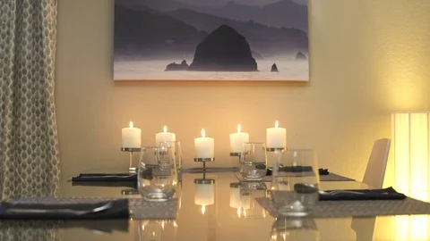 Medium shot of a woman setting a table Stock Footage 76234599