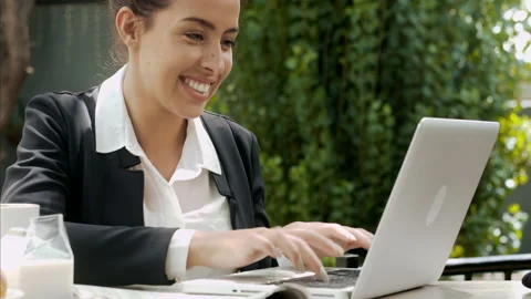 Medium shot of young attractive professional woman having a coffee break, multit Stock Footage 199634849