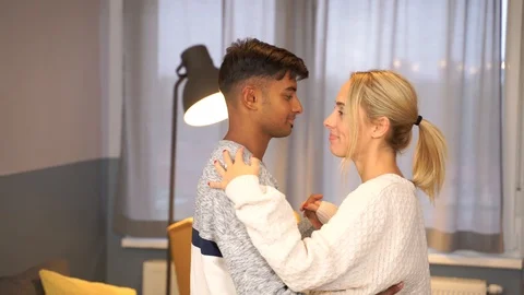 Medium shot of young couple dancing together. Stock Footage 119301930