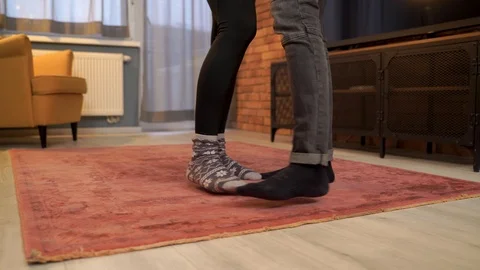 Medium shot of young couple dancing together. Stock Footage 119302304