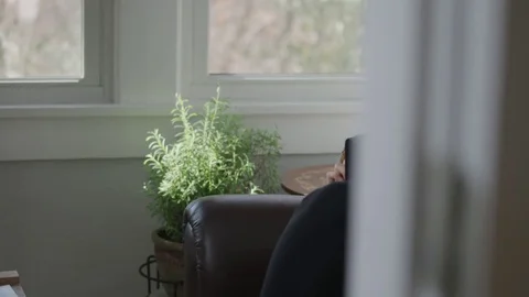 Medium shot of young lady gaming Stock Footage 70809079