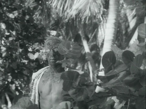 Medium shot of zombie walking in forest, 1970s Video stock 90728146