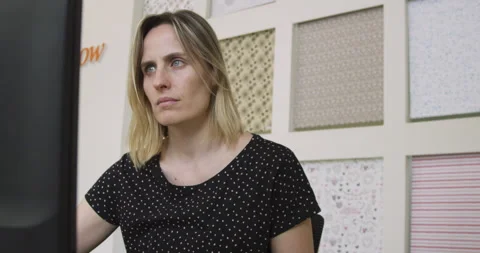 Medium side view shot of female home decoration shop owner working in front of Stock Footage 277966426