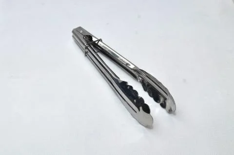 Medium-sized clothespin as kitchen equipment Stock Photos