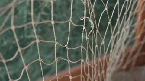 A medium sized fishing net stands on the balcony Stock Footage 316516879