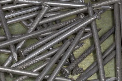 Medium sized nails, top view close-up Stock Photos