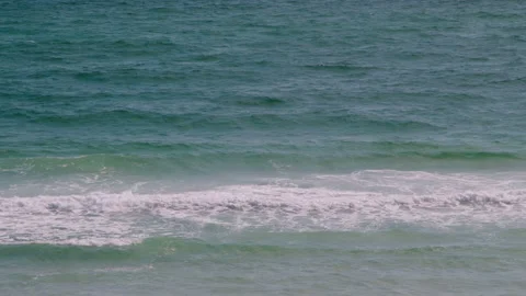 Medium Slow Motion of Gentle Waves With White Caps crashing in Gulf of Mexico of Video stock 133014291