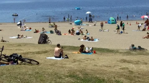Medium time lapse shot of a beach on July 4th - 4K Stock Footage 134398946