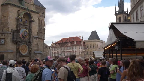 Medium of tourists crowded in front of Prague's Astronomical Clock Video stock 284790467