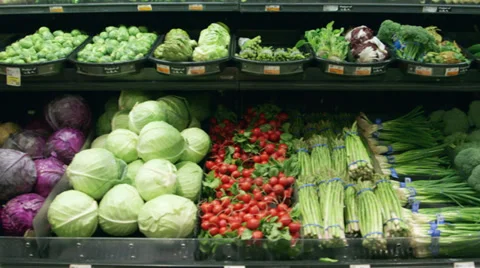 Medium tracking shot of vegetables in a grocery store Stock Footage 35291233
