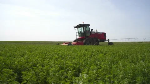 Medium Tracking of a Swather Stock Footage 221863196