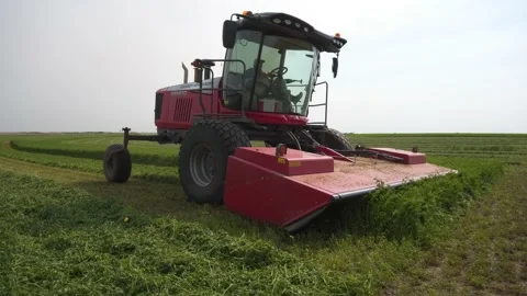 Medium Tracking of a Swather Turning Around Stock Footage 221863195