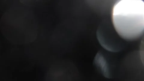 Medium, two-tone bokeh shimmering in the dark Vídeo Stock 318844799
