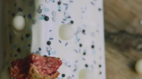 Medium view of cake topped with a baked red star Stock Footage 342129574