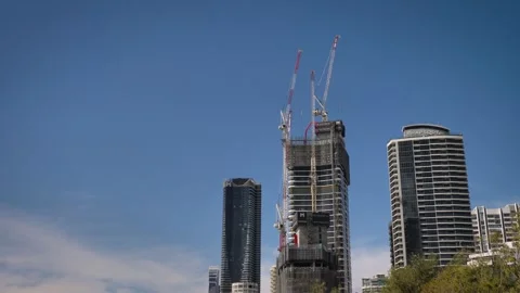 Medium view of cranes on a construction site on the Esplanade, Surfers Paradise. Stock Footage 332561209