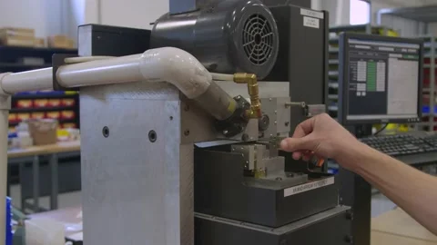 Medium view key copying machine worker in workshop Tool Locksmith Stock Footage 161802560