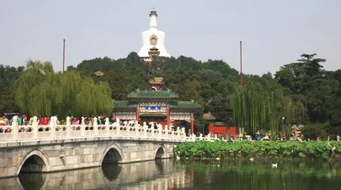 Medium view of the white dagoba in china's beihai park Stock Footage 59718337