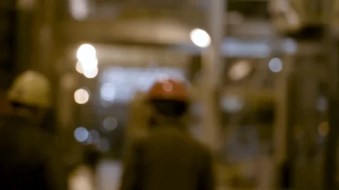 Medium Wide Shot. Men Walking from Camera - Out of Focus Stock Footage 89944415