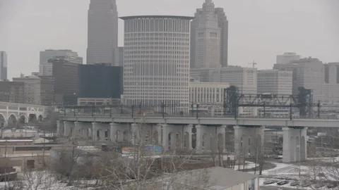 Medium Wide Shot of pan across Cityscape of Cleveland during Winter Stock Footage 89945561