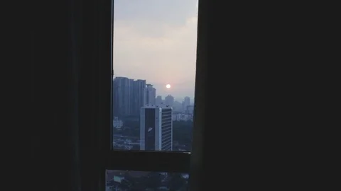 Medium zoom in a hotel room during sunset. Stock Footage 111469869