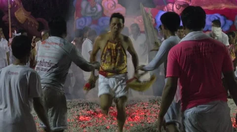 Mediums Run Across Coals Stock Footage 58090826