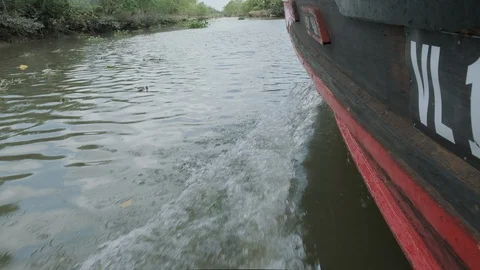 Meekong Delta Vietnam - Water passing boat bow Stock Footage