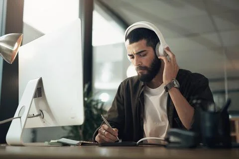 Meet your commitments with the right mindset. a young businessman writing in a Foto stock