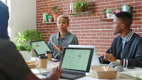 Meeting, communication and collaboration with tablet analytics of customer Stock Footage 234029237